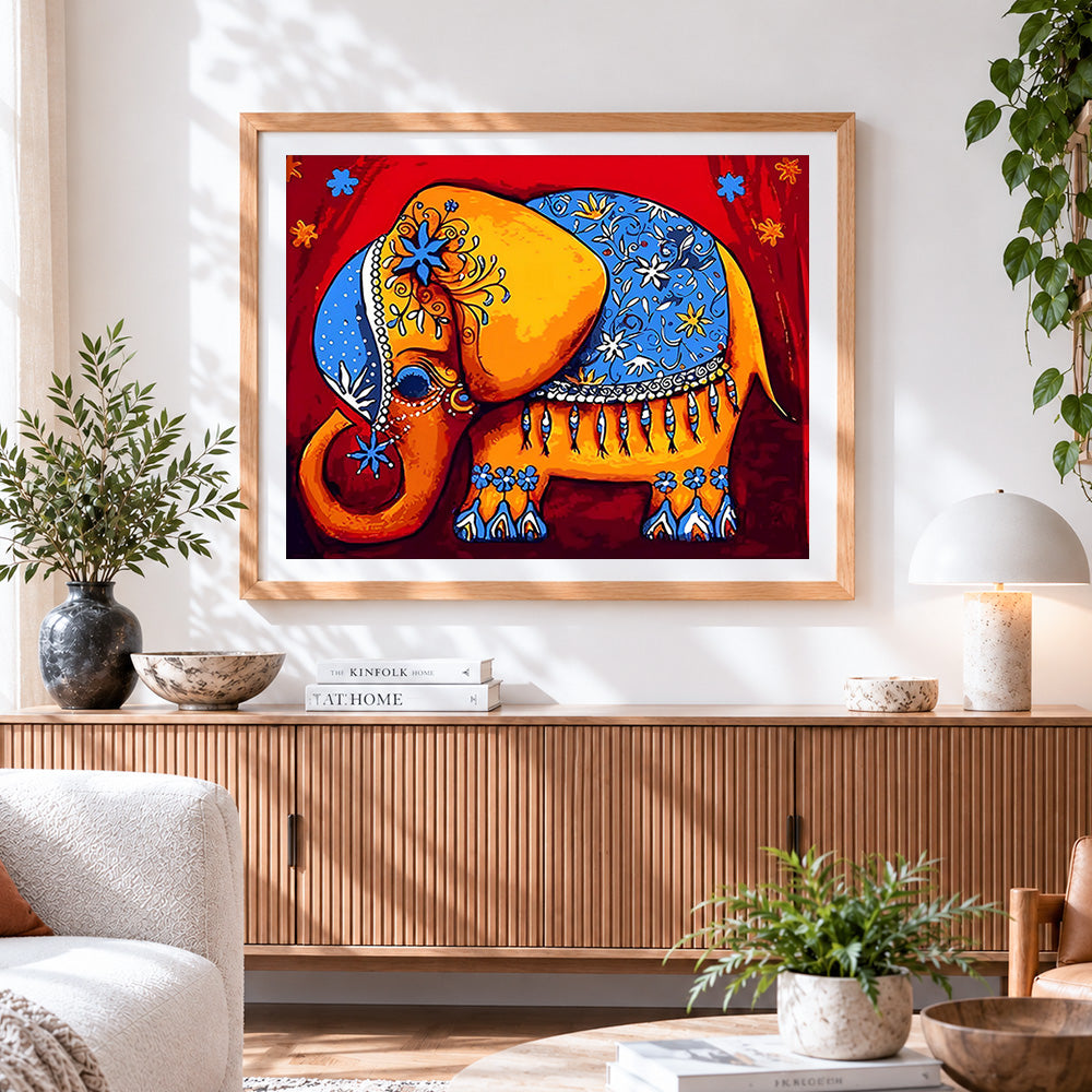 Finished folk art painted elephant cross stitch artwork displayed