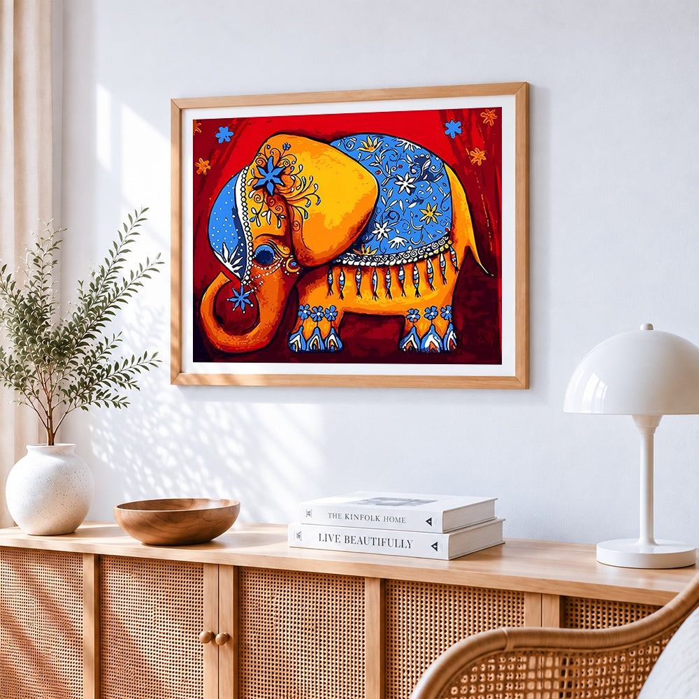 Folk art painted elephant cross stitch artwork displayed on wall as home decor