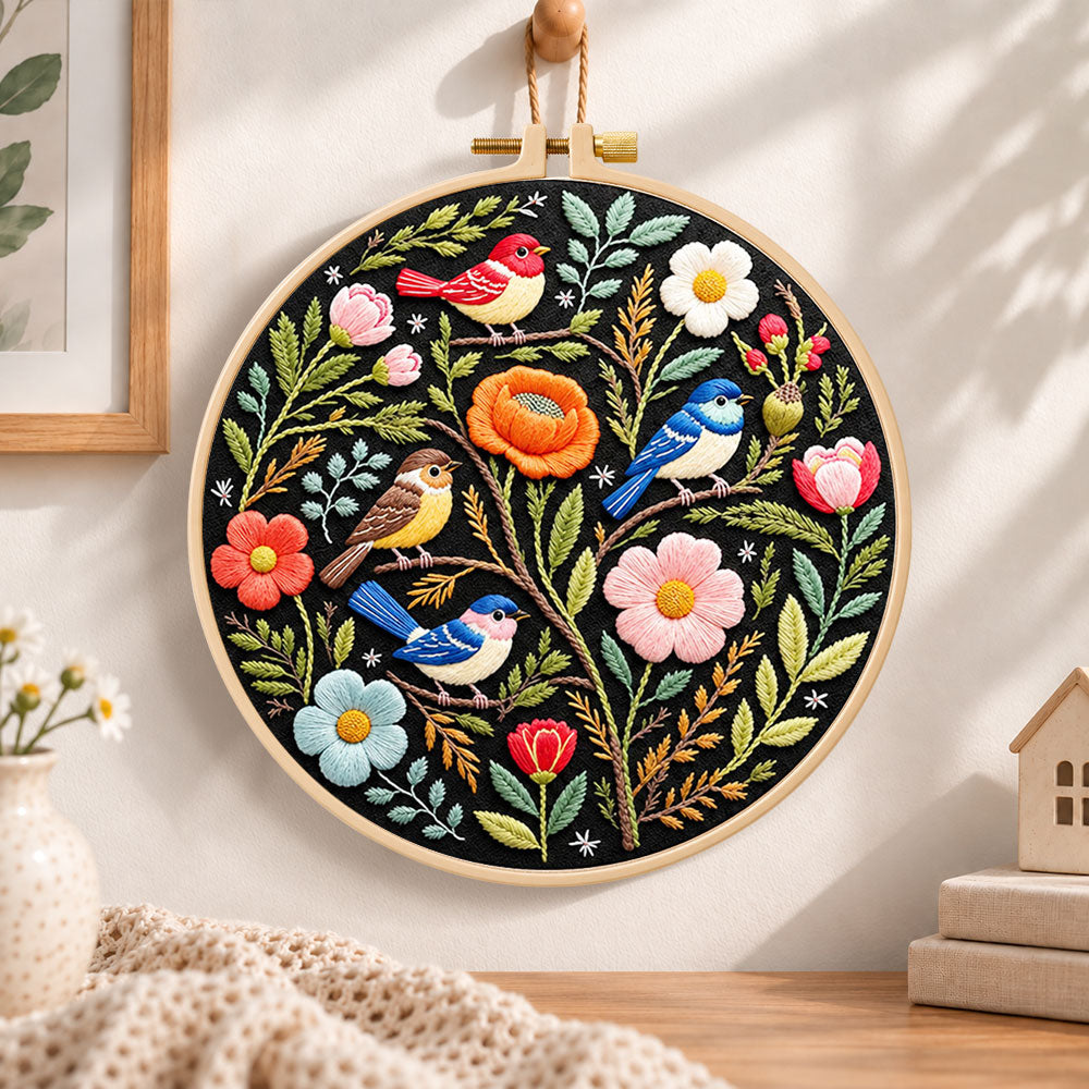 Forest birds and spring blooms embroidery hoop wall art displayed as warm and cosy handmade home decor