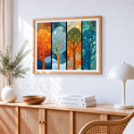 Four seasons abstract trees cross stitch artwork displayed on wall as home decor