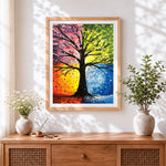 Finished four seasons tree cross stitch artwork displayed