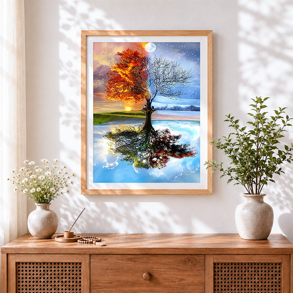 Finished four seasons tree reflection cross stitch artwork displayed