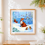 Finished fox in a winter wonderland cross stitch artwork displayed
