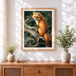 Finished fox on a tree branch cross stitch artwork displayed