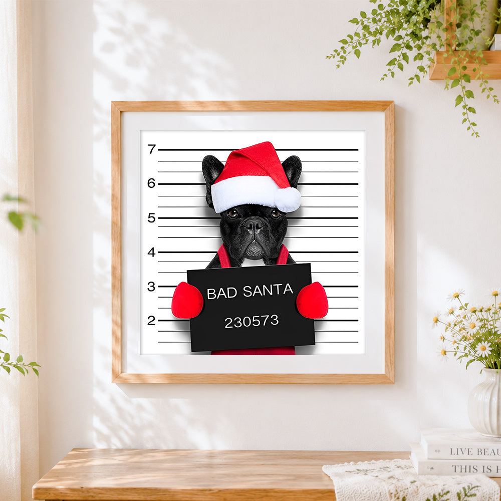 Finished french bulldog "bad santa" mugshot cross stitch artwork displayed
