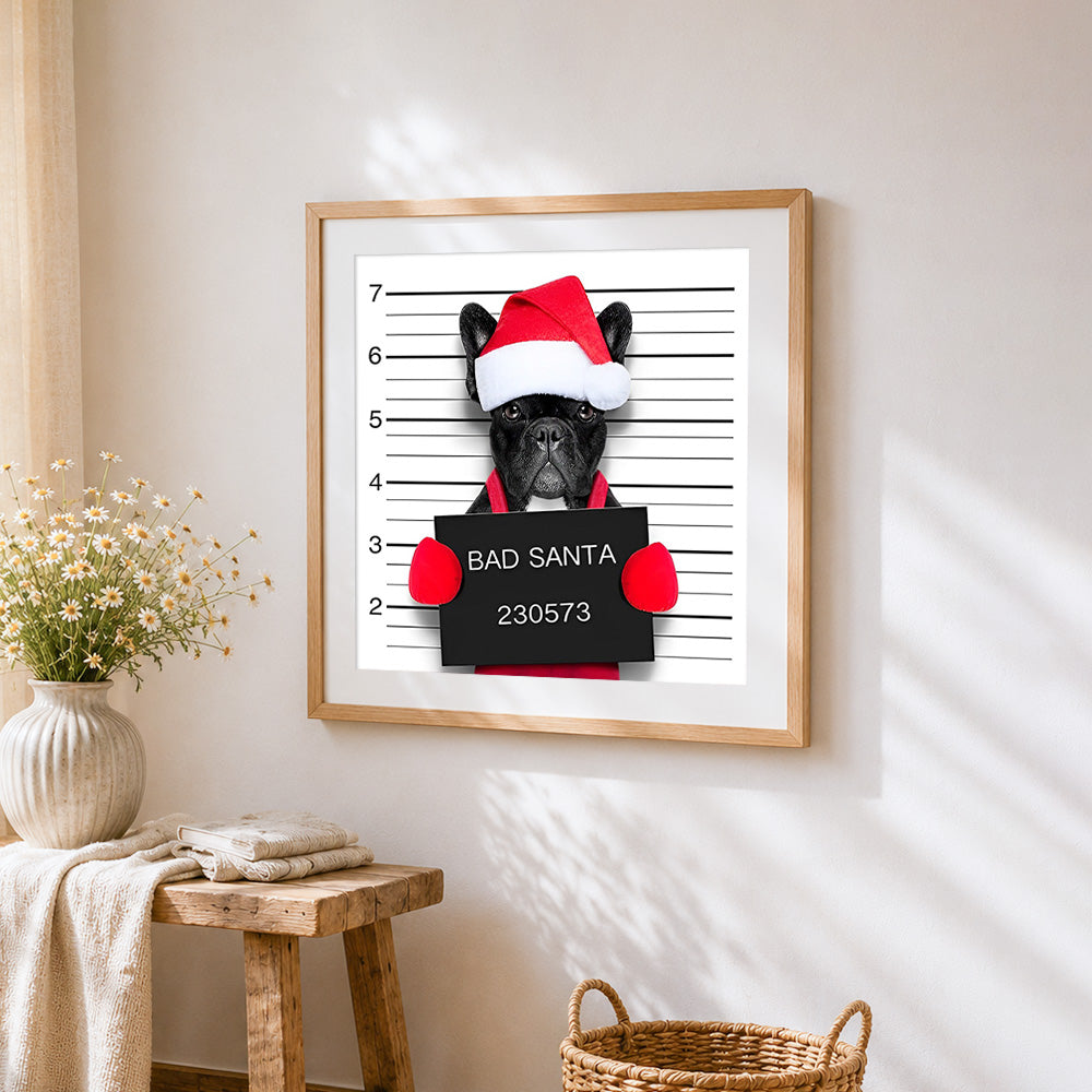 French bulldog "bad santa" mugshot cross stitch artwork displayed on wall as home decor