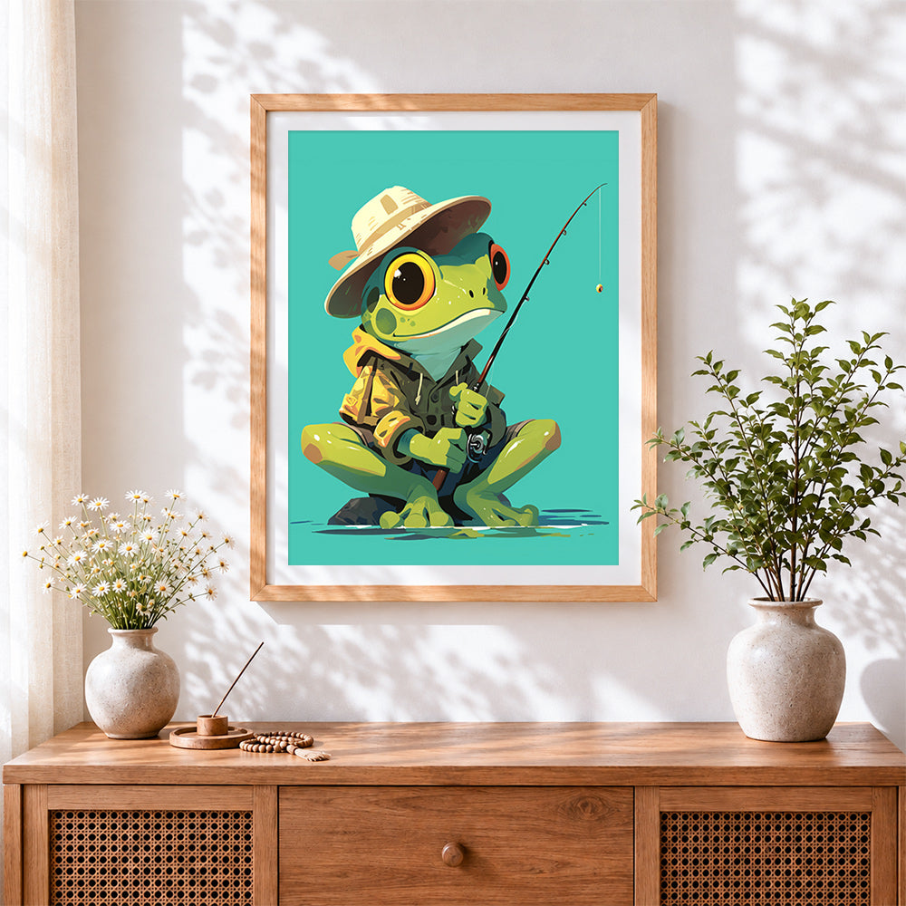 Finished frog fisherman with hat cross stitch artwork displayed