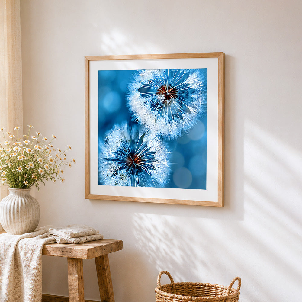 Frosty blue dandelions paint by numbers artwork displayed on wall as home decor