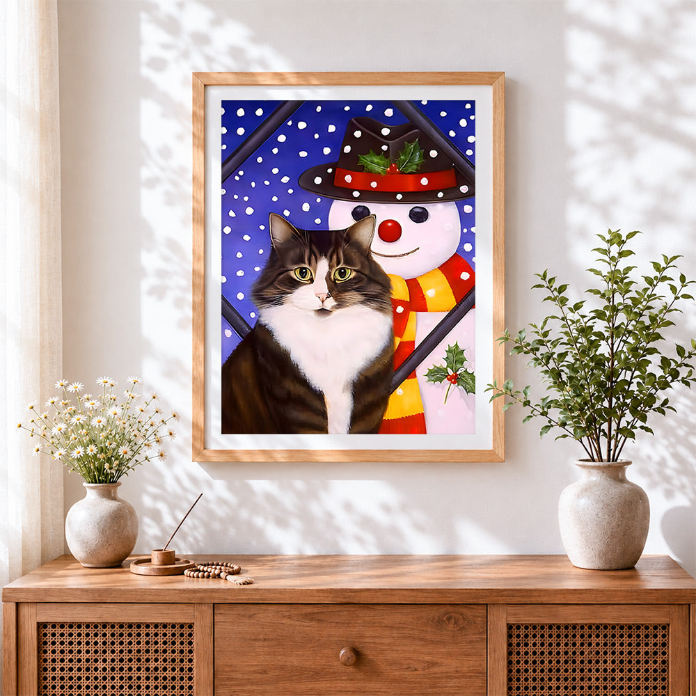 Finished fun cat with a snowman cross stitch artwork displayed
