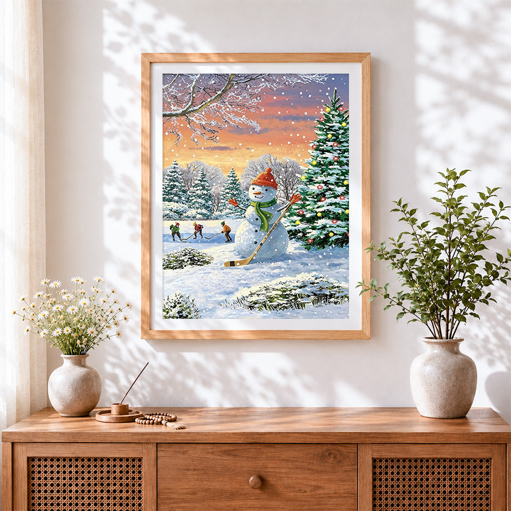 Finished fun snowman playing ice hockey cross stitch artwork displayed