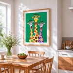 Funny cartoon giraffes with shocked faces cross stitch artwork displayed on wall as home decor