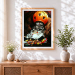 Finished funny cat in a pumpkin helmet with sweets cross stitch artwork displayed