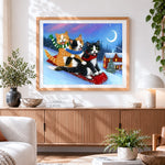 Finished funny cats sledging in the snow cross stitch artwork displayed