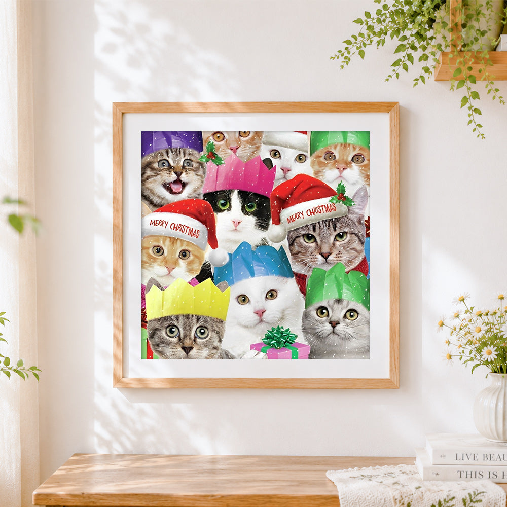 Finished funny christmas cats in santa hats cross stitch artwork displayed