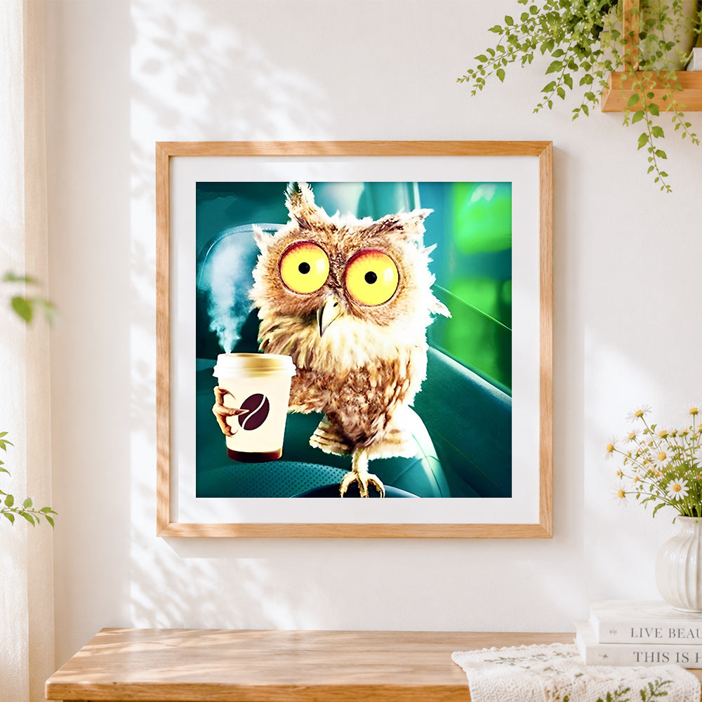 Finished funny owl with a coffee cup cross stitch artwork displayed