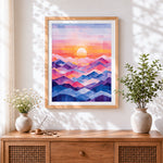 Finished geometric abstract mountains and sunrise cross stitch artwork displayed