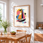 Geometric abstract sailboat cross stitch artwork displayed on wall as home decor