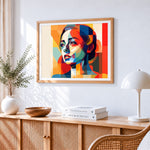 Geometric abstract woman cross stitch artwork displayed on wall as home decor