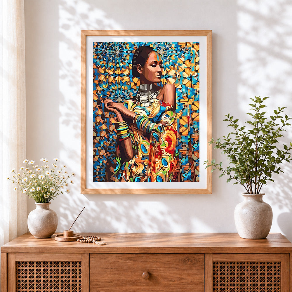 Finished geometric african woman with collar cross stitch artwork displayed