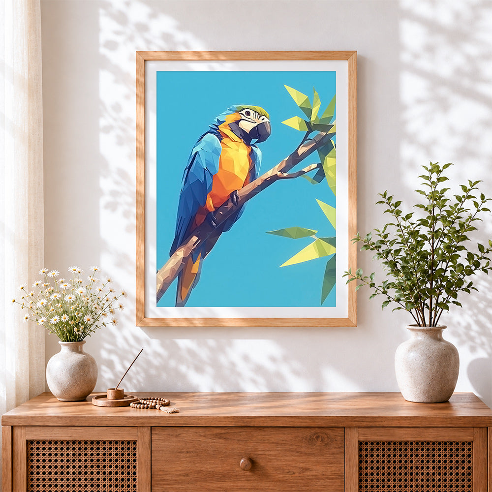 Finished geometric blue and yellow macaw cross stitch artwork displayed