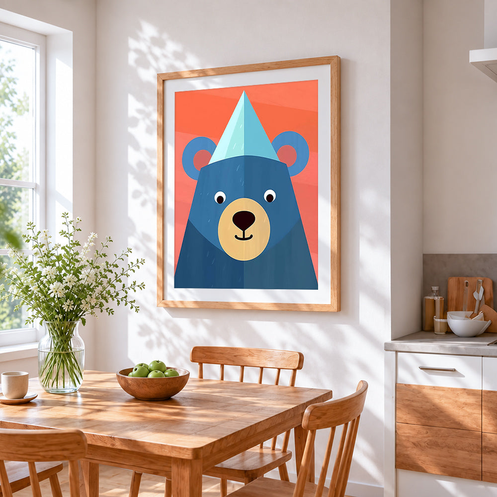 Geometric blue bear with party hat cross stitch artwork displayed on wall as home decor