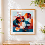 Finished geometric circles and colour blocks cross stitch artwork displayed