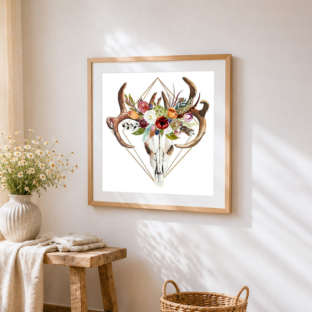 Geometric floral deer skull cross stitch artwork displayed on wall as home decor