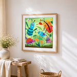Geometric ladybirds on leaves cross stitch artwork displayed on wall as home decor