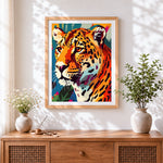 Finished geometric leopard portrait cross stitch artwork displayed