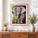 Finished geometric patterned elephant cross stitch artwork displayed