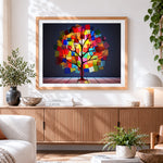 Finished geometric rainbow mosaic tree cross stitch artwork displayed
