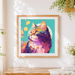 Finished geometric whimsical cat cross stitch artwork displayed