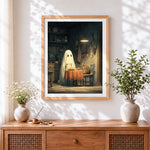 Finished ghost and cat eating spaghetti cross stitch artwork displayed