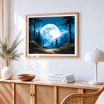 Giant moon over forest path cross stitch artwork displayed on wall as home decor