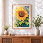 Finished giant sunflower and little daisies cross stitch artwork displayed