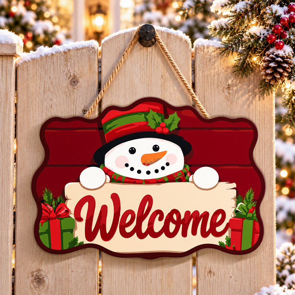 Gift box snowman paint by numbers door hanger on a garden gate