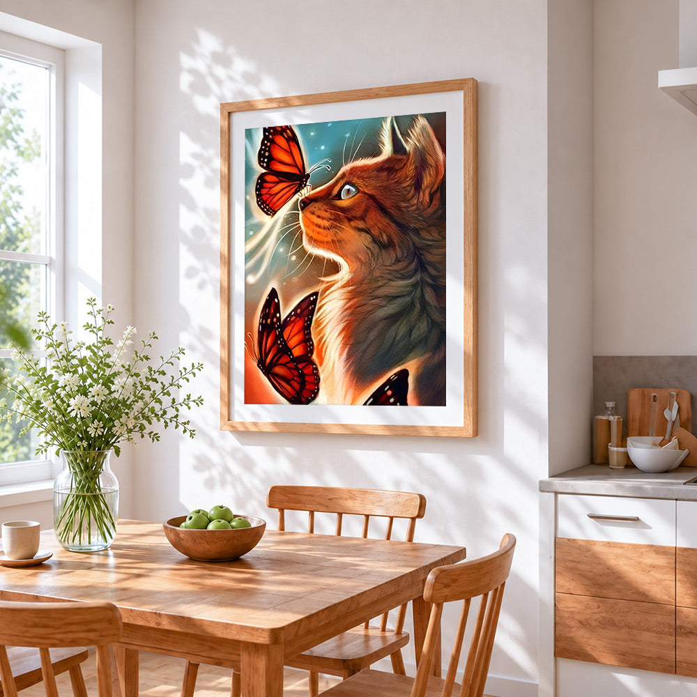 Ginger cat and orange butterflies cross stitch artwork displayed on wall as home decor
