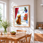 Ginger cat looking at a snowy church cross stitch artwork displayed on wall as home decor