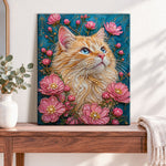 Finished ginger cat with pink blooms pearl diamond painting artwork displayed as home decor