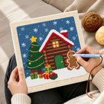 Creating handmade gingerbread man cabin punch needle artwork