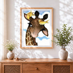 Finished giraffe and yellow birds cross stitch artwork displayed