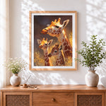Finished giraffe family in the golden light cross stitch artwork displayed
