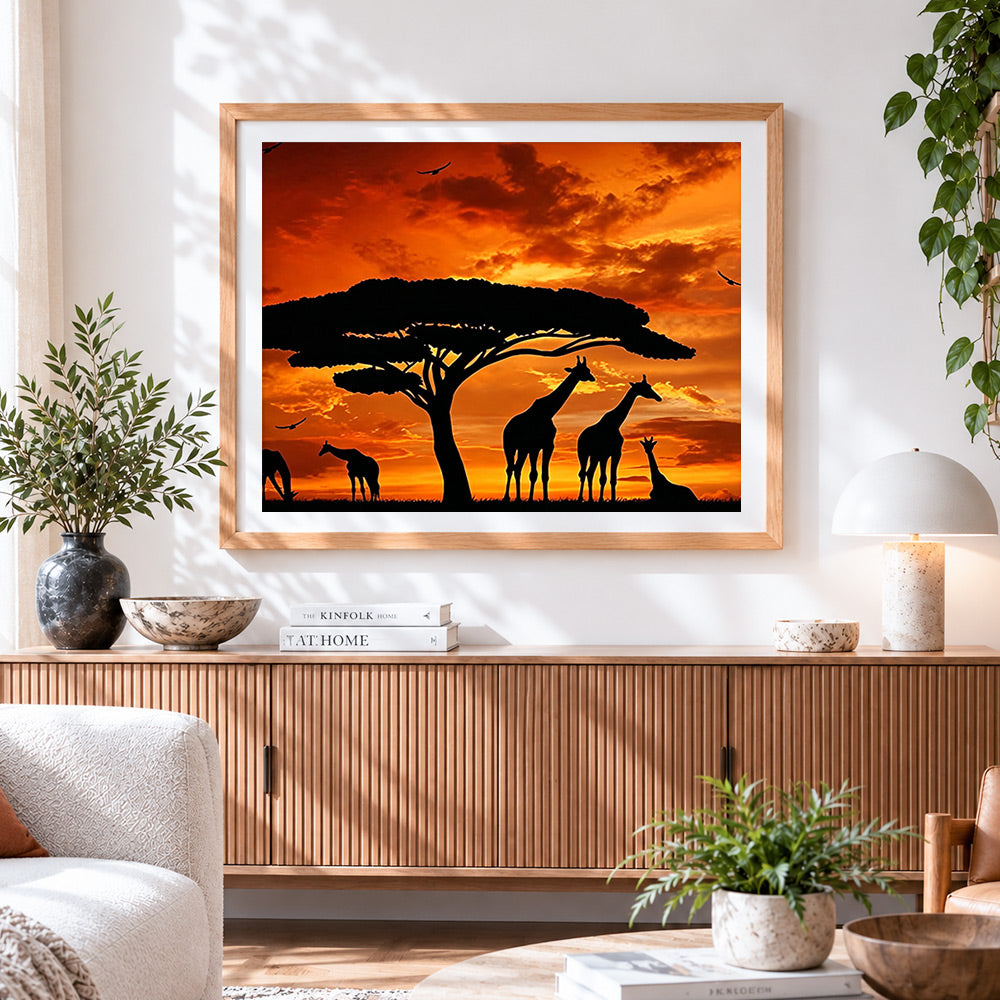 Finished giraffe silhouettes at sunset paint by numbers artwork displayed as home decor