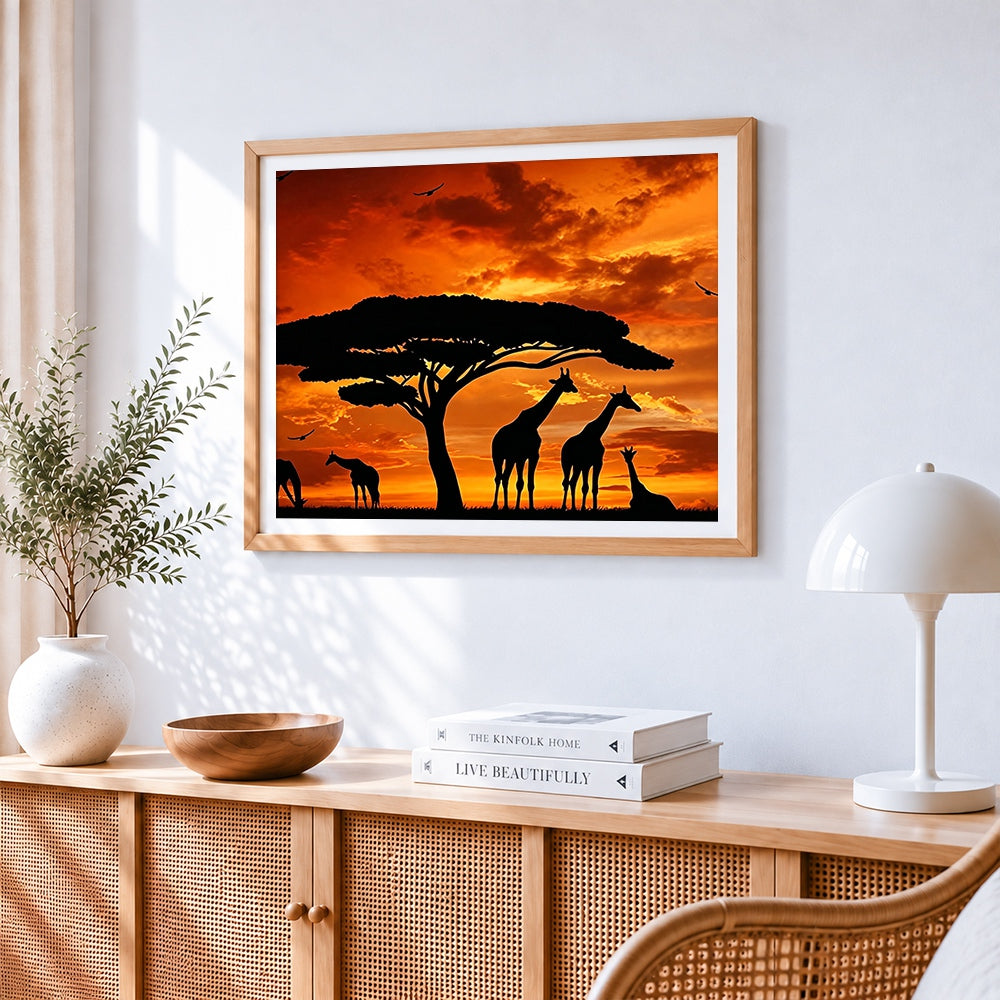 Giraffe silhouettes at sunset paint by numbers artwork displayed on wall as home decor