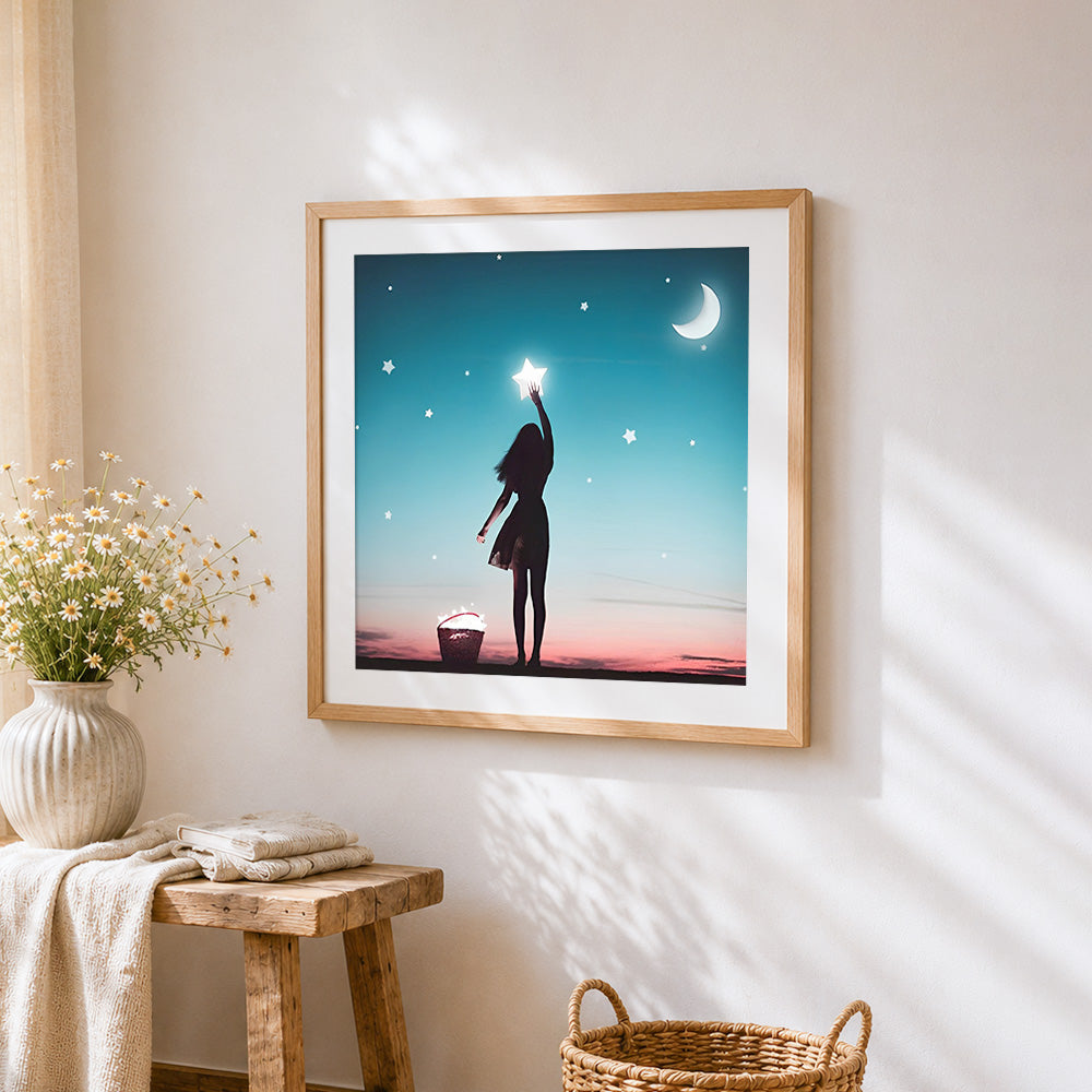 Girl catching stars cross stitch artwork displayed on wall as home decor