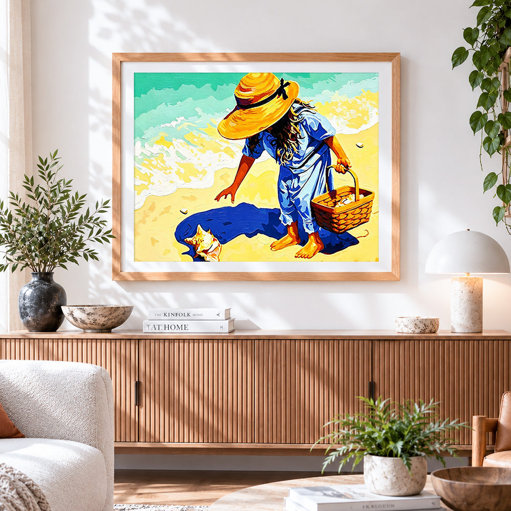 Finished girl collecting seashells on the beach cross stitch artwork displayed