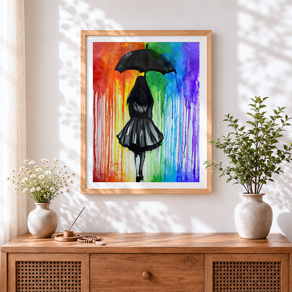 Finished girl with black umbrella in rainbow rain cross stitch artwork displayed