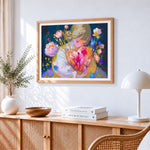 Girl with heart and flowers paint by numbers artwork displayed on wall as home decor