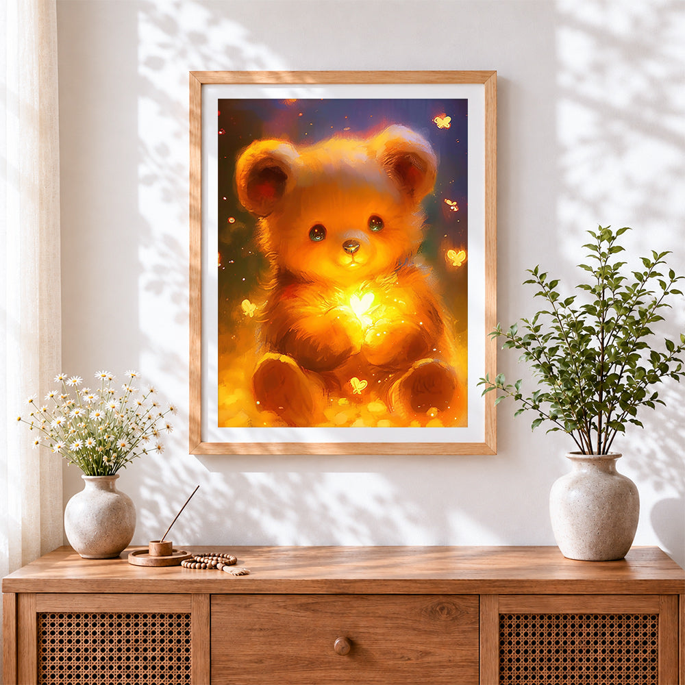 Finished glowing bear with butterflies cross stitch artwork displayed