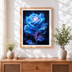 Finished glowing blue flower with sparkles cross stitch artwork displayed